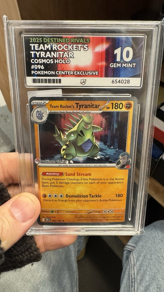 Team Rocket’s Tyranitar 096/182 - Pokemon Center Stamped - ACE 10 With Swirl